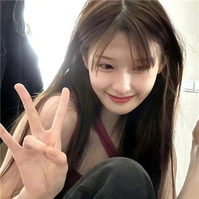 桃花含露又春风